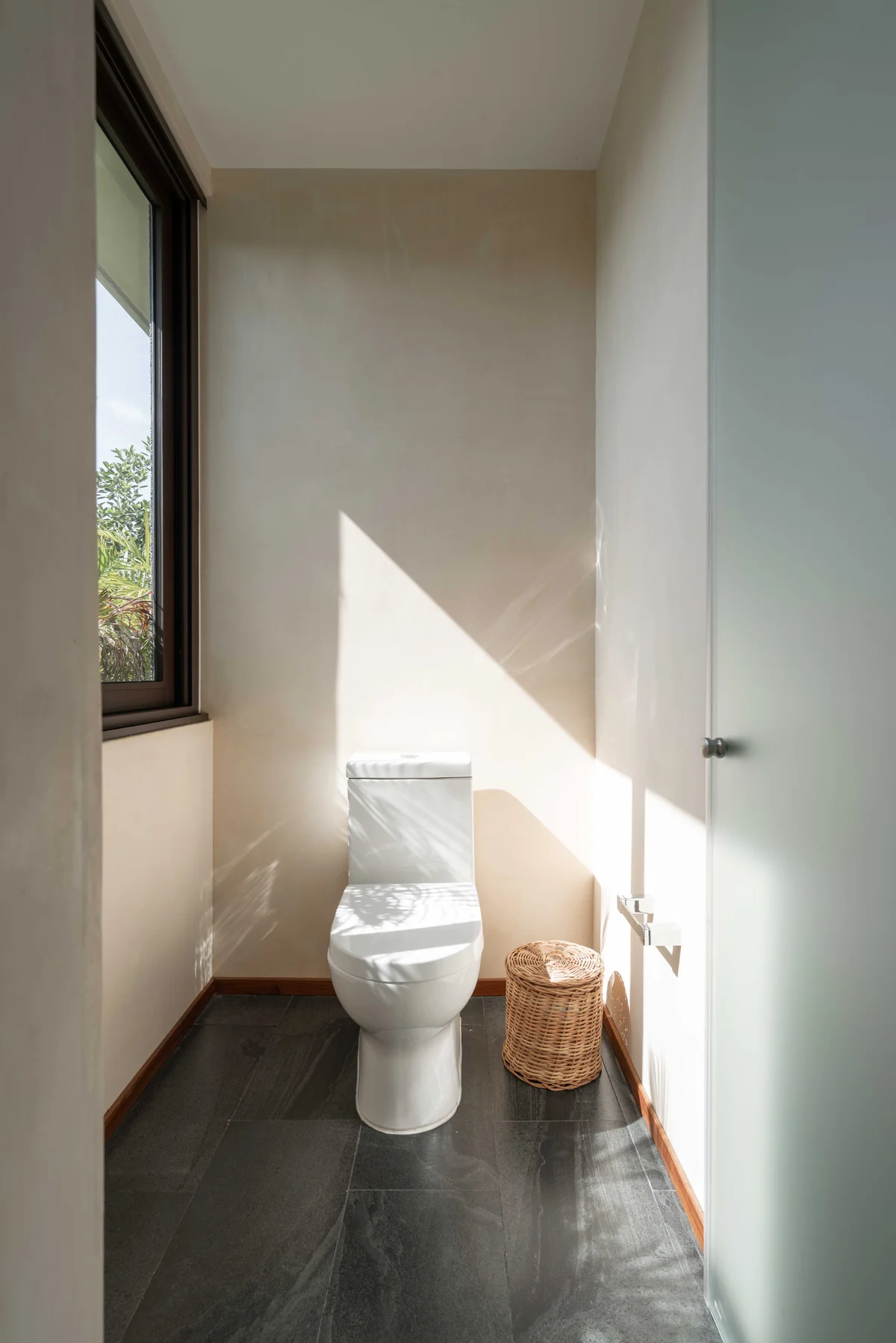 Image of a Minimalist Bathroom, featuring Natural Light and Slate Tile Flooring.