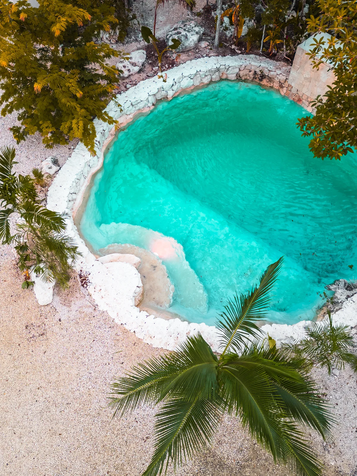 Image of a Lagoon-Style Pool, featuring Natural Stone Pool and Turquoise Water.