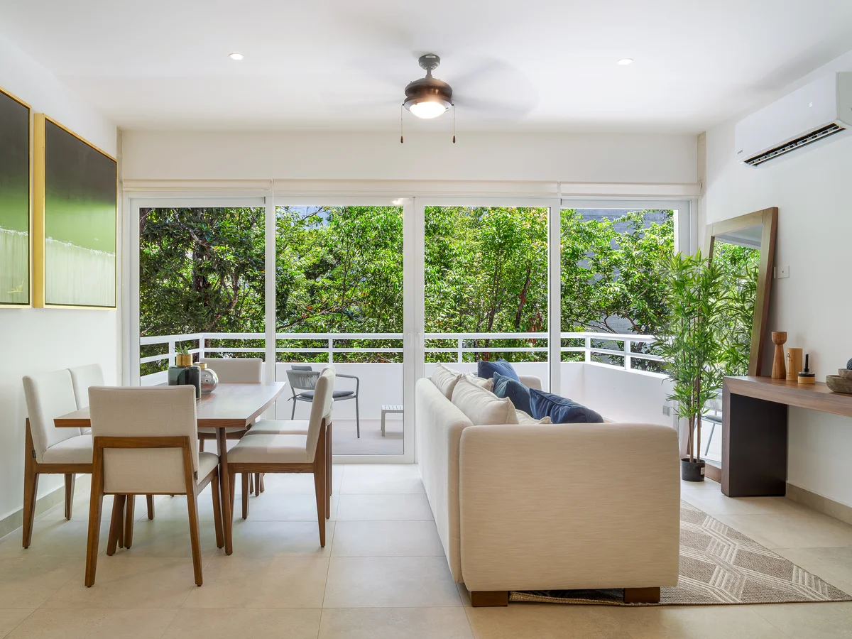 View of Living Room at Tao Tulum, showcasing Dining Area, Open Concept.