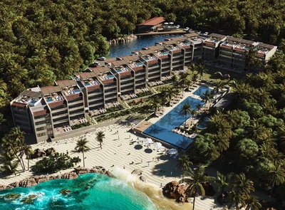 Image of a Beachfront Condominiums, featuring Ocean View and Rooftop Plunge Pools.