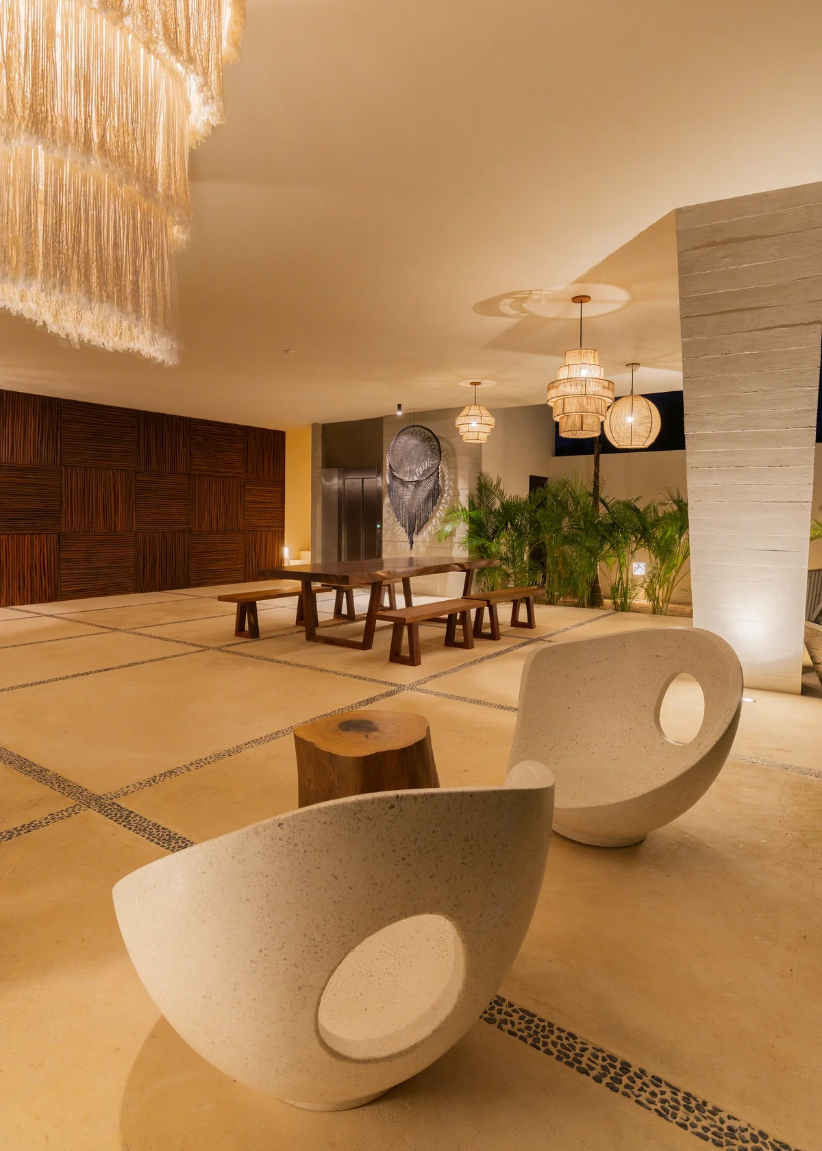 Image of a Spacious Lobby, featuring Modern Rustic Design and Textured Wood Wall.