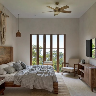 Image of a Bedroom Suite, featuring Wood Furniture and High Ceilings.
