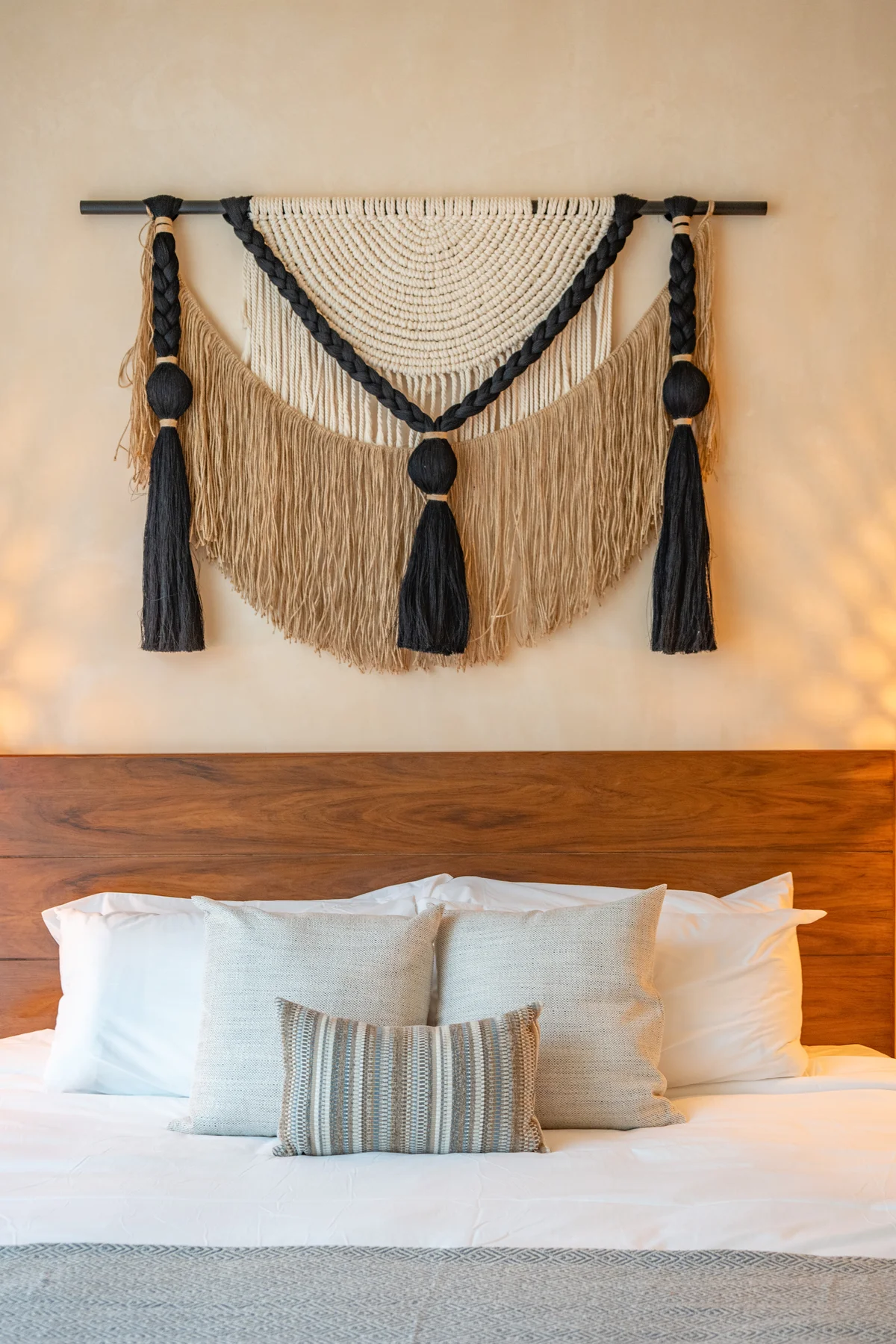 Image of a Bohemian Decor, featuring Macrame Wall Art and Wooden Headboard.