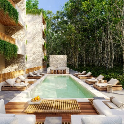 Image of a Poolside Lounge Area, featuring Natural Stone Architecture and Lush Jungle Surroundings.