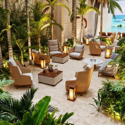Image of a Outdoor Lounge, featuring Sandy Courtyard and Lush Garden.