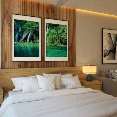 Image of a Luxury Bedroom, featuring Wood Panel Accent Wall and Bedroom Sitting Area.