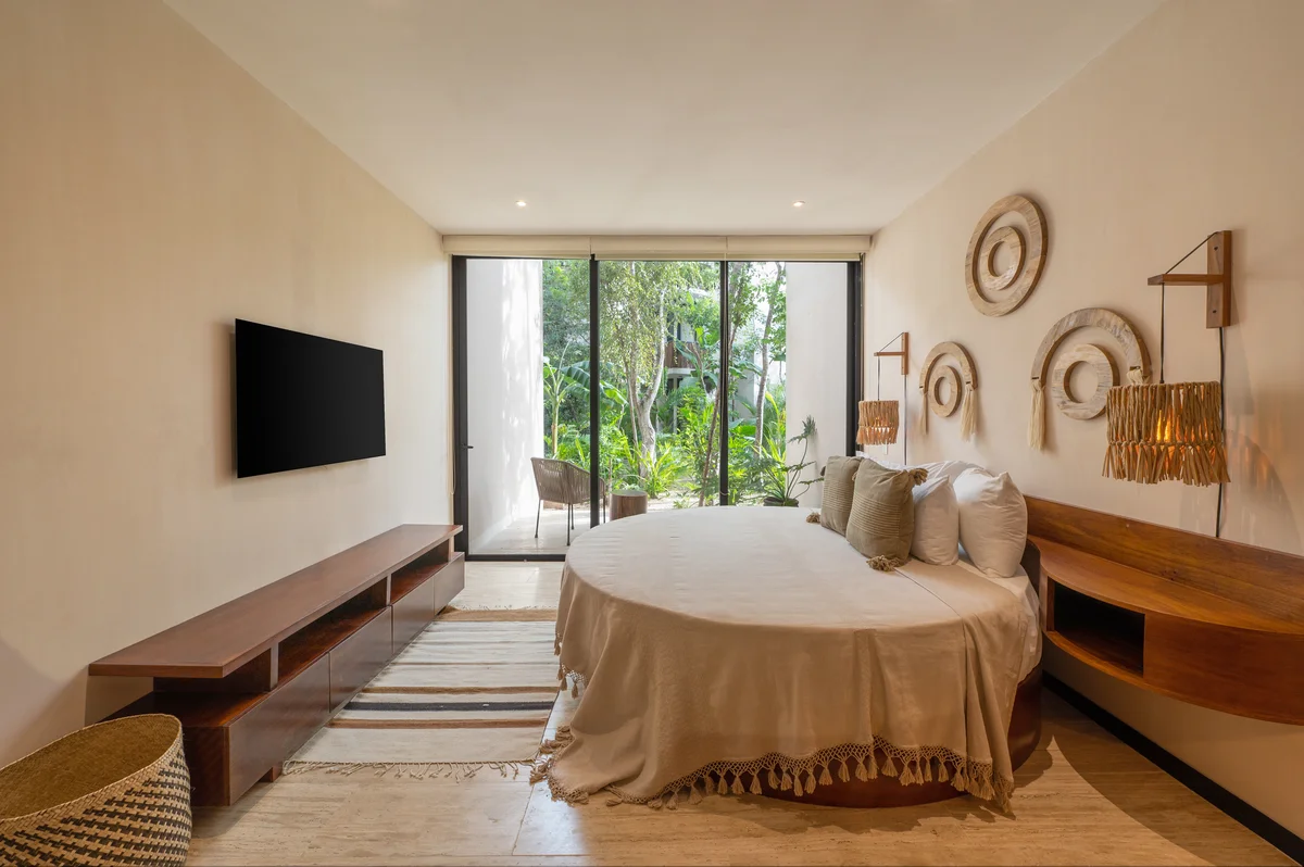 Image of Garden at Ophelia, featuring Modern Bedroom, Round Bed.