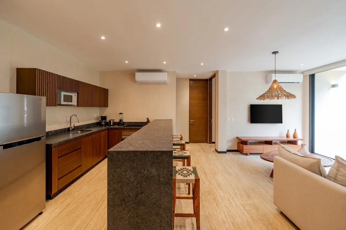 View of Open Concept Living at Ophelia, showcasing Modern Kitchen, Breakfast Bar.