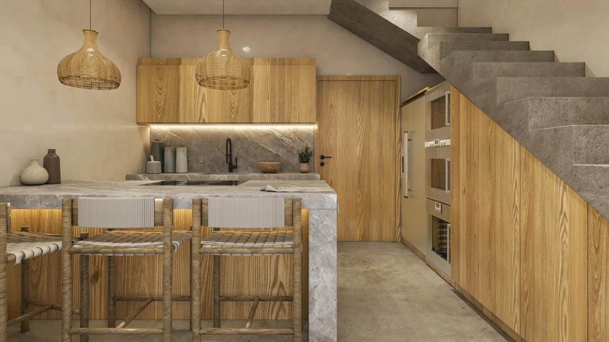 View of Modern Kitchen at Xiib Kaab, showcasing Natural Wood Cabinetry, Stone Countertops.