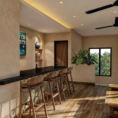Image of a Lounge Area, featuring Breakfast Bar and Stone Accents.