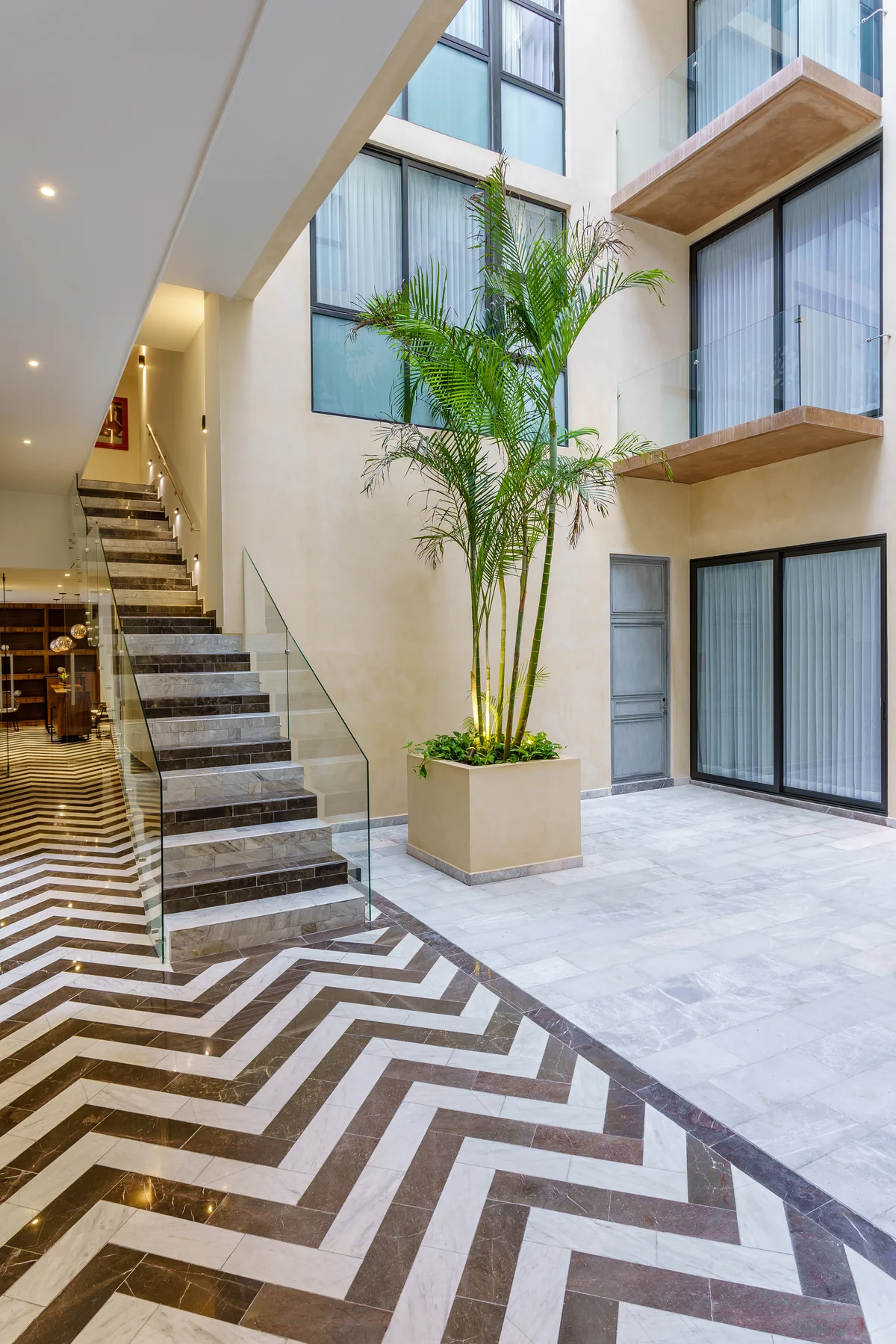 Image of Lobby at Singular Joy, featuring Modern Lobby, Interior Courtyard.