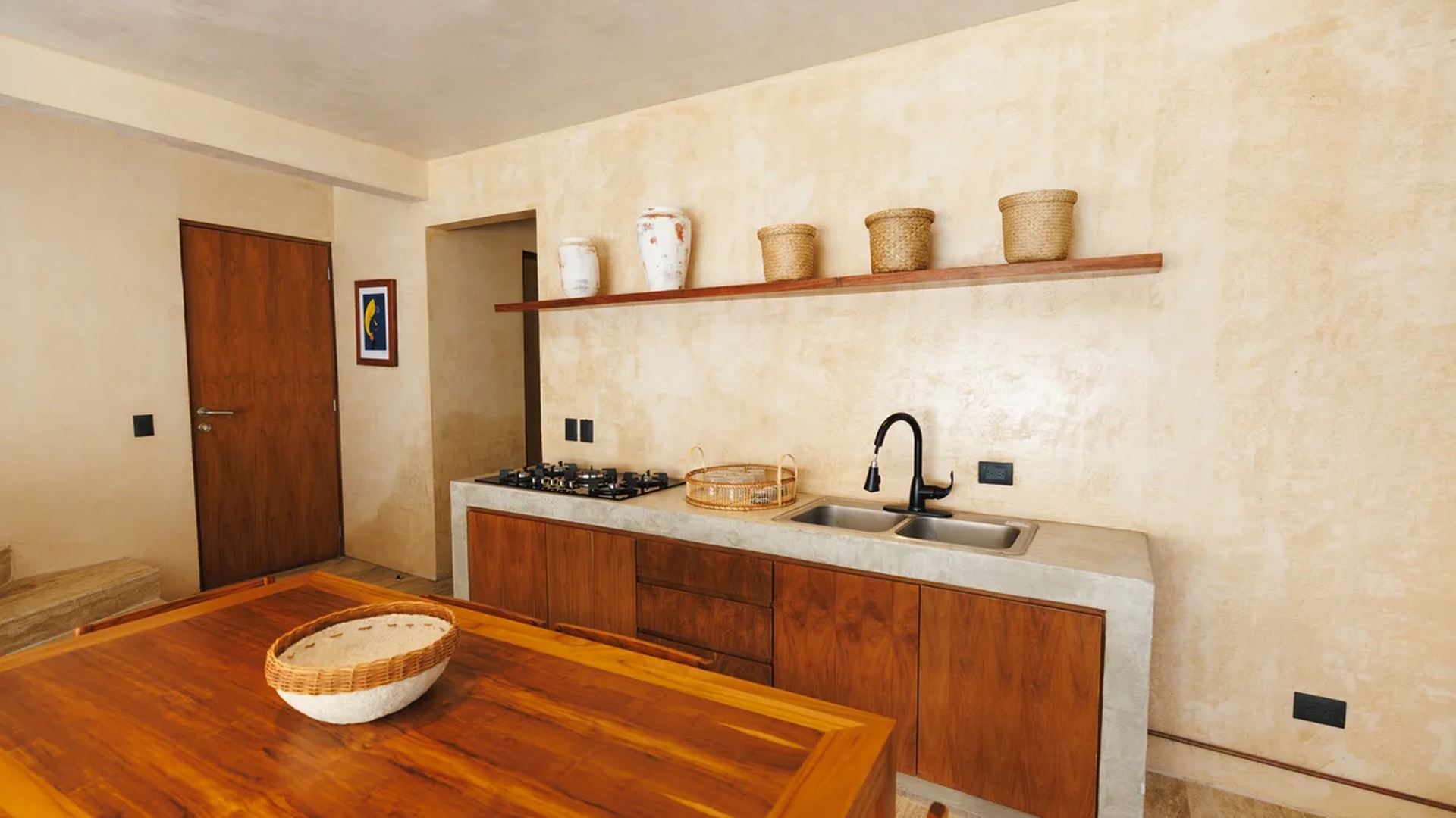 Image of a Kitchenette, featuring Dining Area and Concrete Countertops.