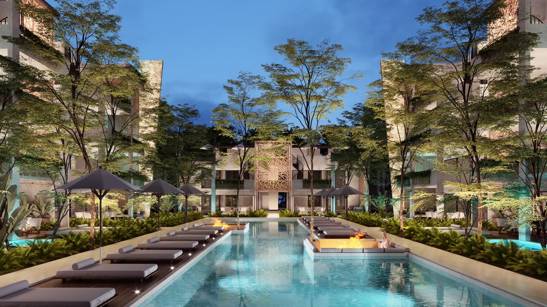 Image of a Resort-Style Pool, featuring Central Courtyard and Lush Landscaping.