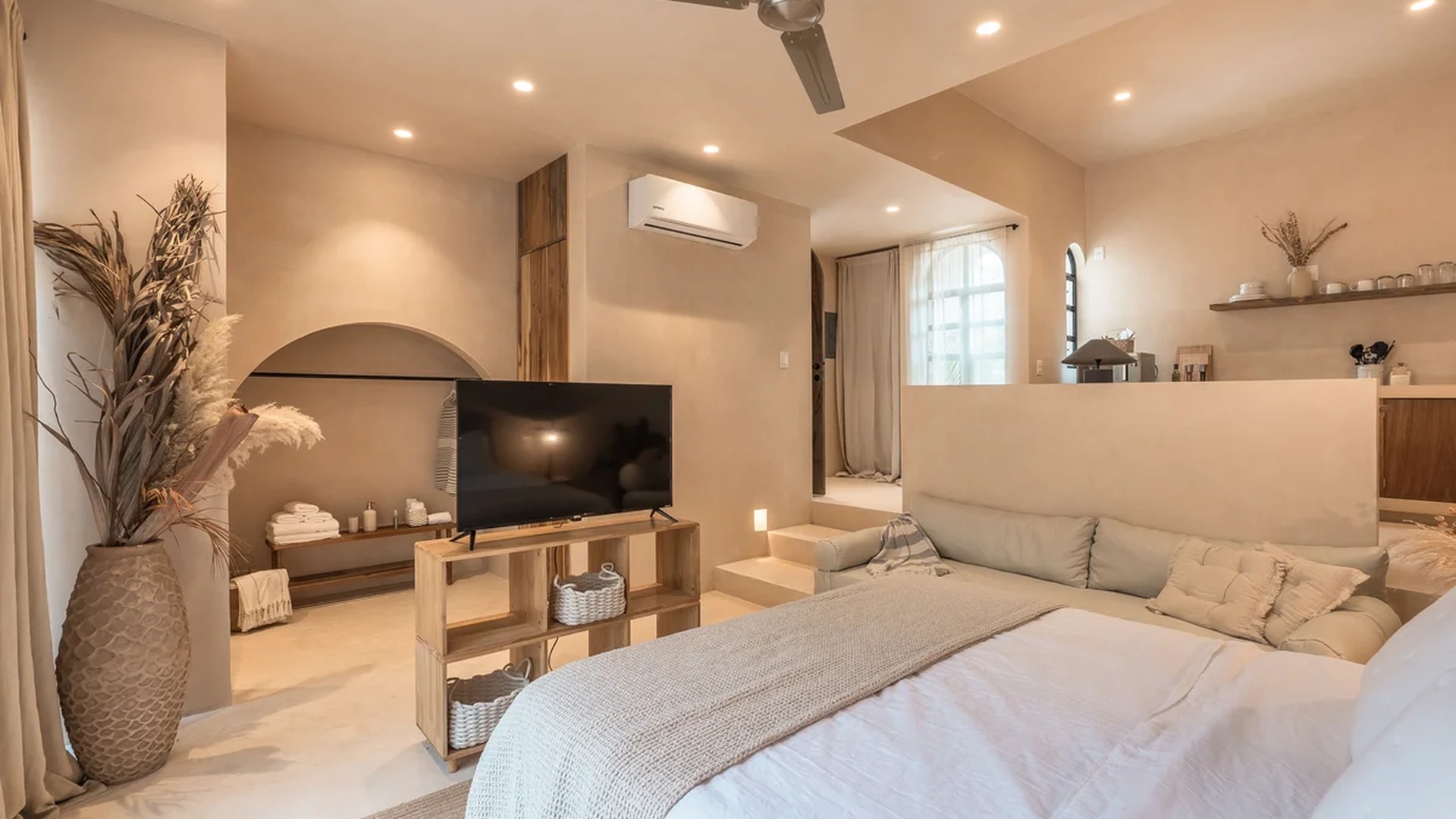 Image of a Bedroom Suite, featuring Bohemian Decor and Plaster Walls.