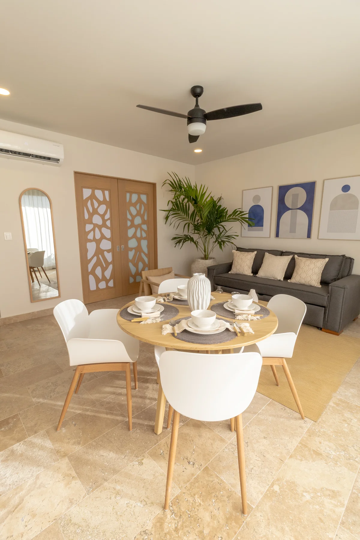 Image of a Open Concept Living, featuring Dining Area and Travertine Tile Flooring.