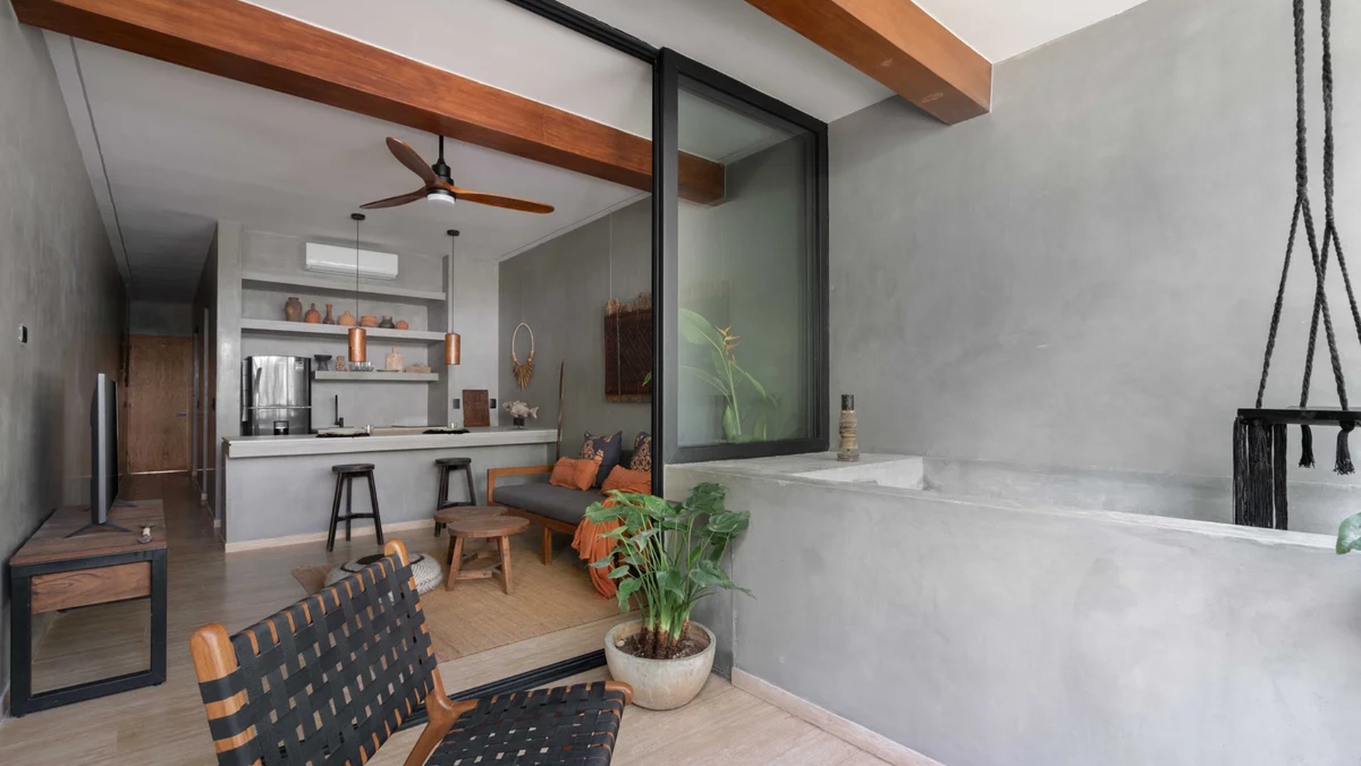 Image of a Industrial Chic Design, featuring Open-Concept Living and Polished Concrete Walls.