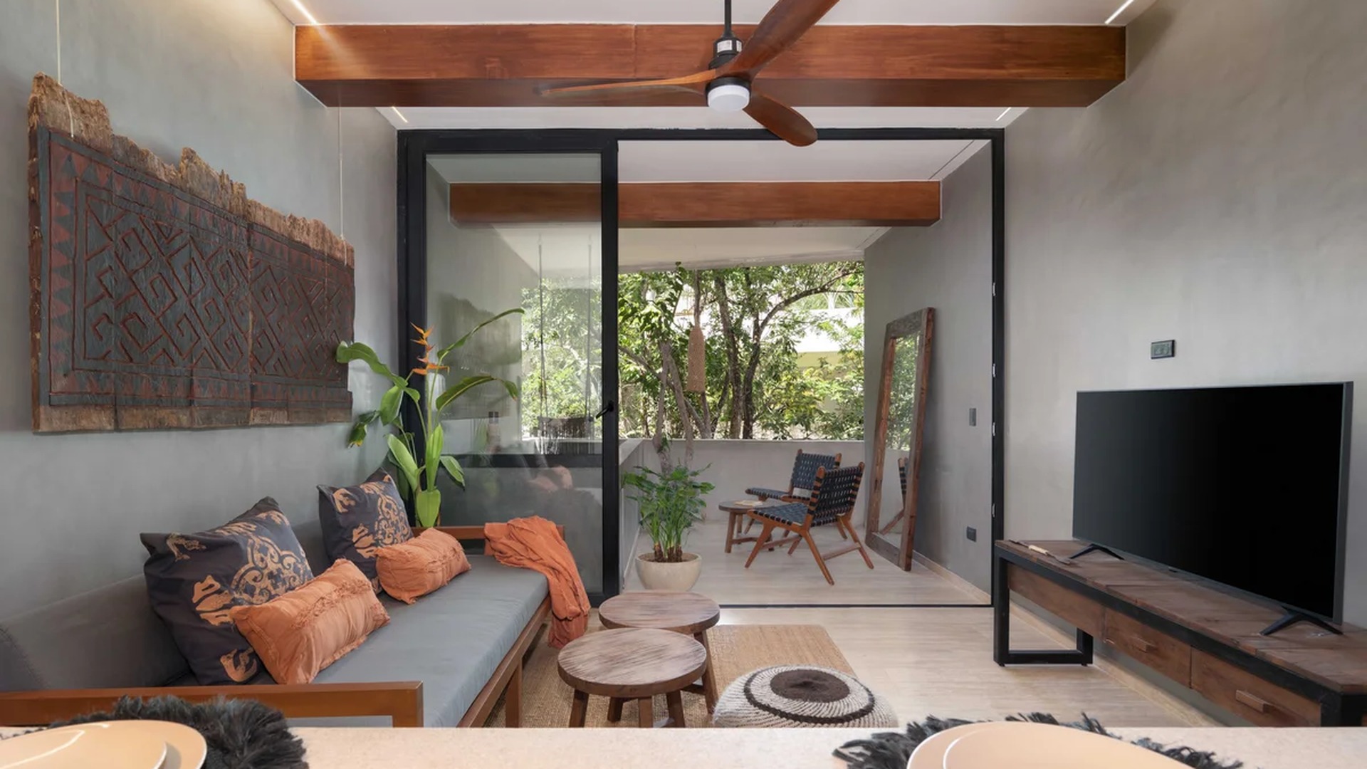 Image of a Living Room, featuring Private Balcony and Sliding Glass Doors.