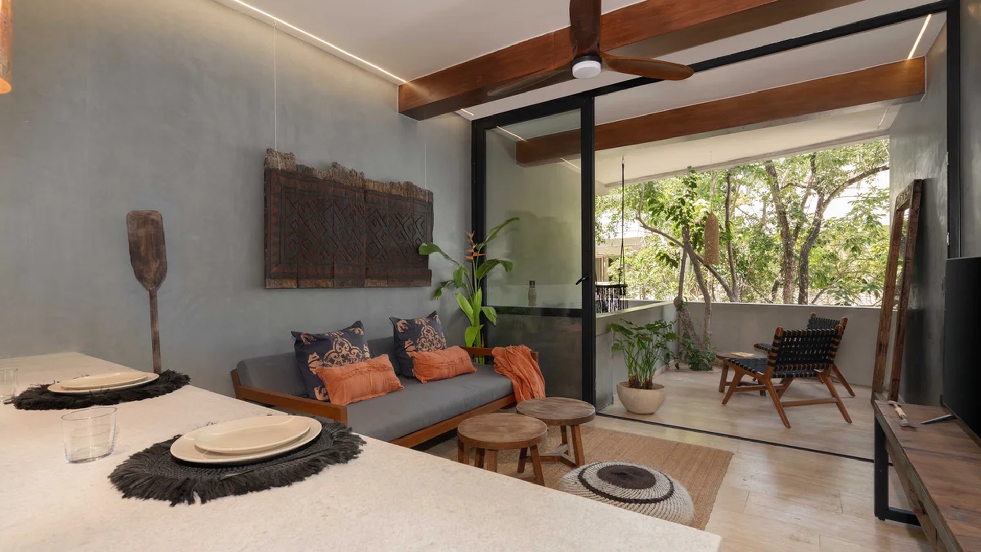 Image of a Indoor-Outdoor Living, featuring Private Balcony and Exposed Wood Beams.
