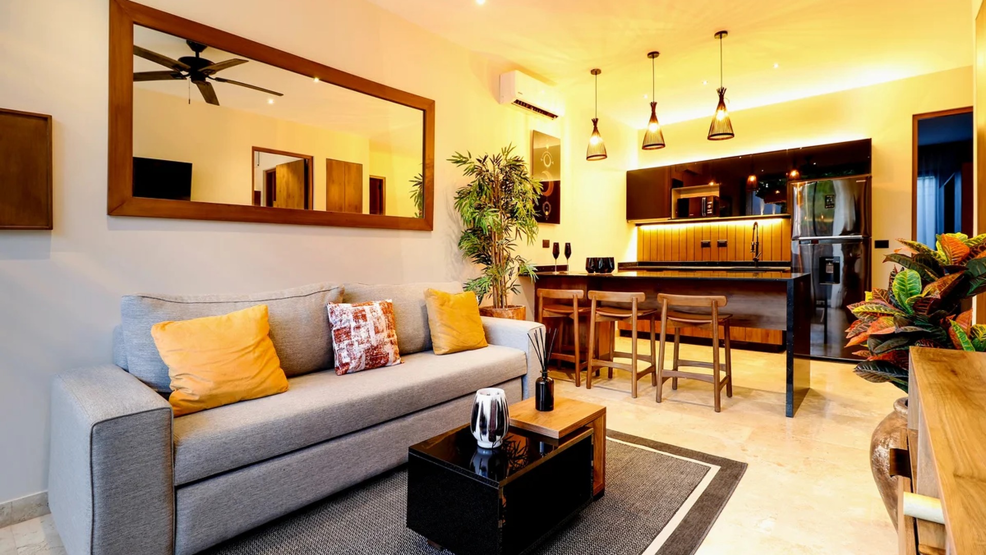 Image of a Open-Concept Living, featuring Modern Kitchen and Breakfast Bar.