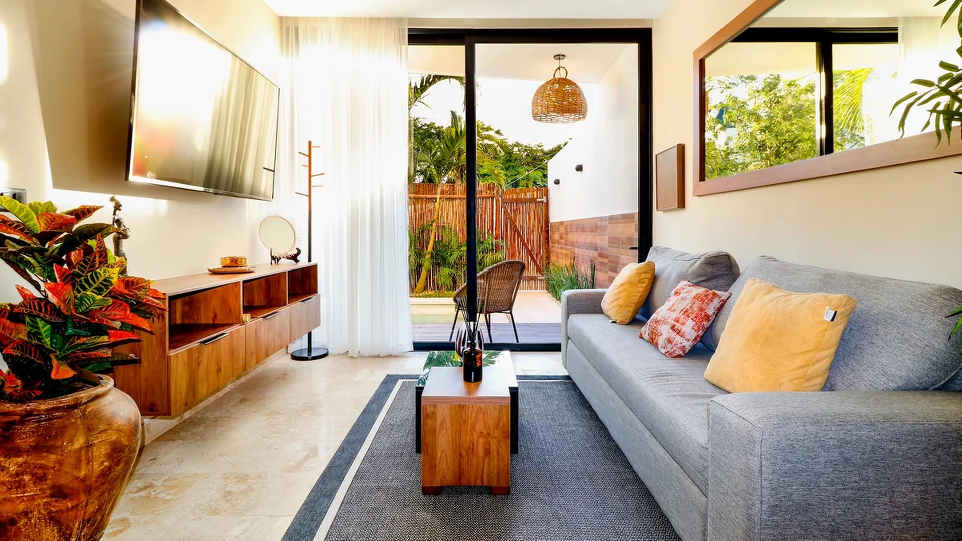 Image of a Living Room, featuring Private Patio and Indoor-Outdoor Living.