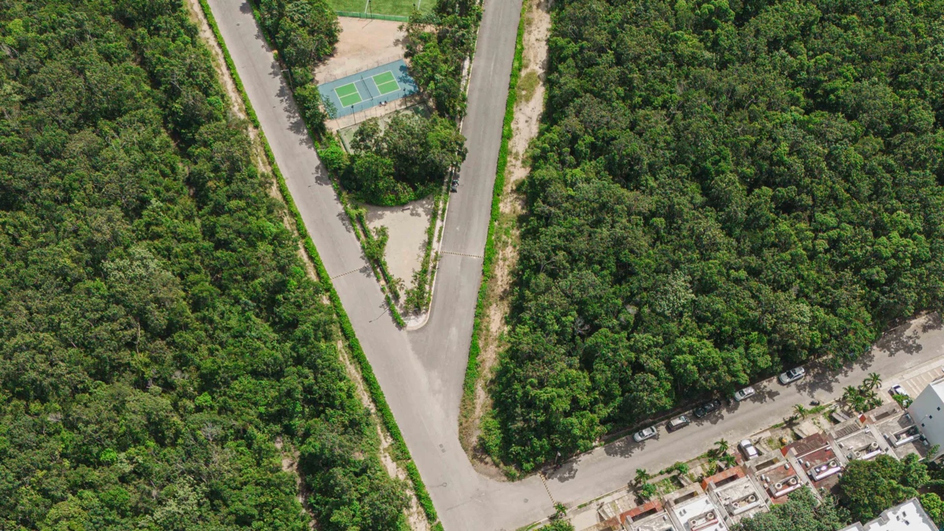 Image of a Aerial View, featuring Residential Community and Lush Greenery.