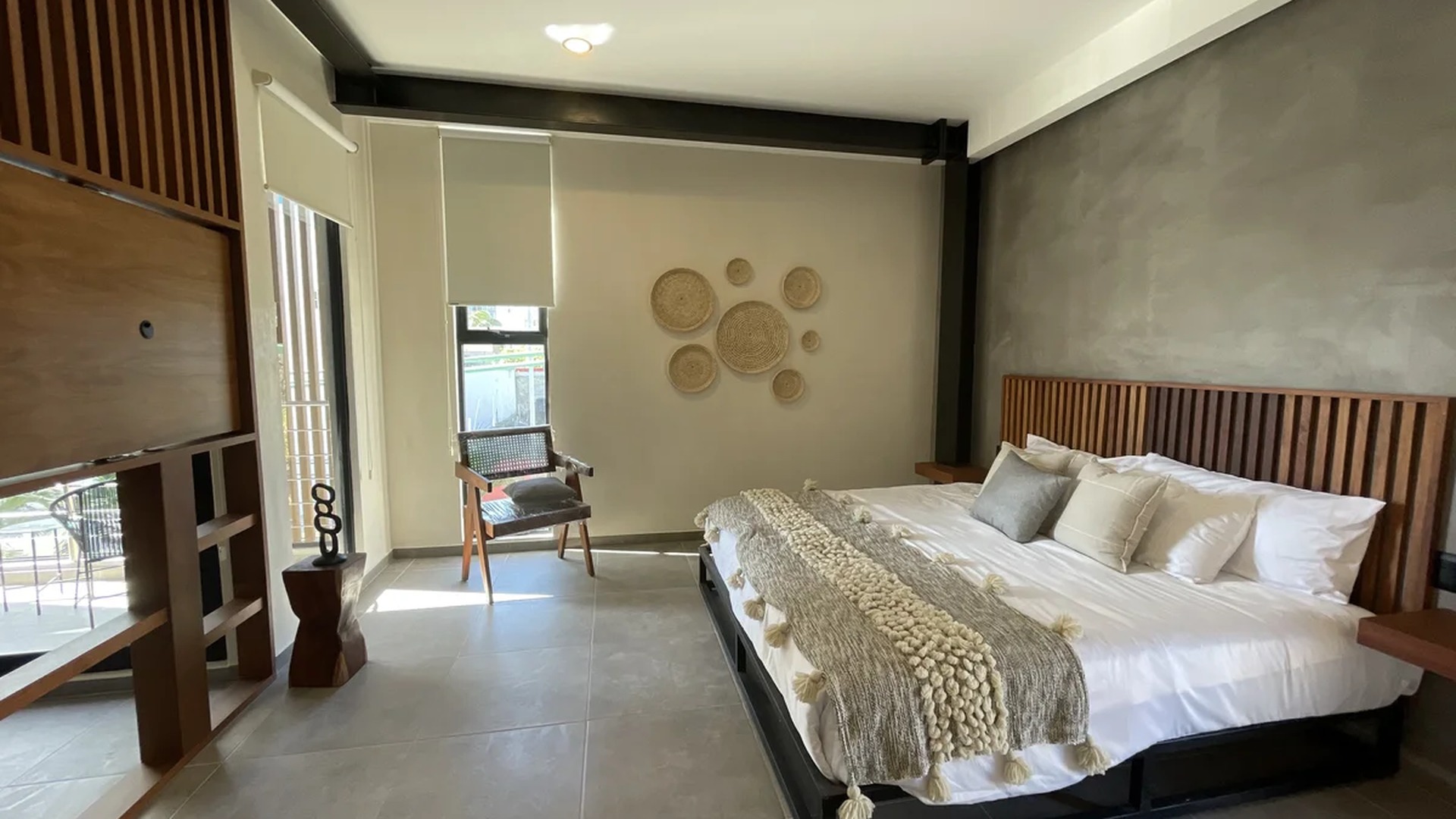 Image of a Modern Bedroom, featuring Industrial Chic Design and Concrete Accent Wall.