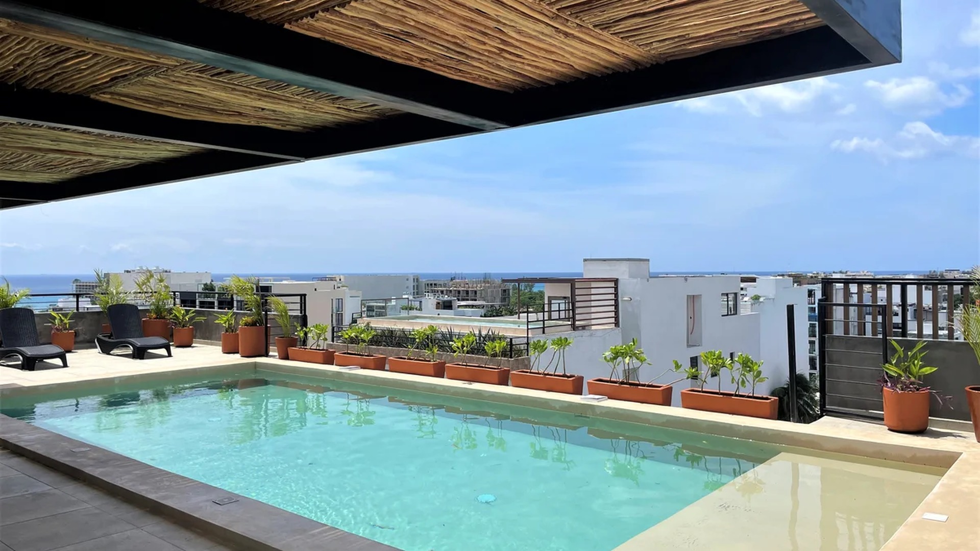 Image of a Rooftop Pool, featuring Ocean View and Sundeck.
