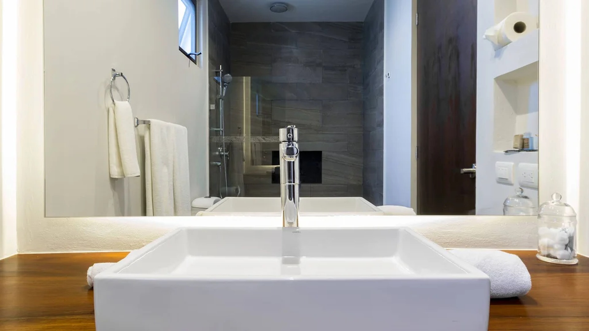 Image of a Modern Bathroom, featuring Vessel Sink and Wood Countertop.