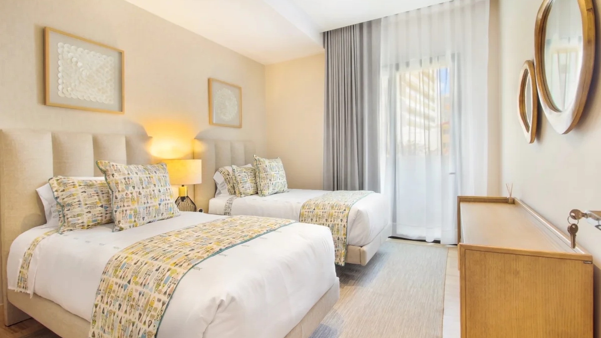 Image of a Twin Bedroom, featuring Contemporary Decor and Upholstered Headboards.