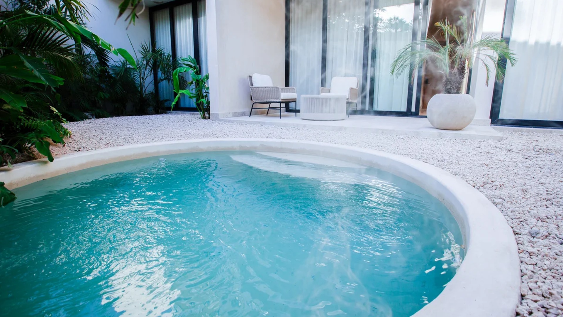Image of a Private Plunge Pool, featuring Private Patio and Lush Greenery.