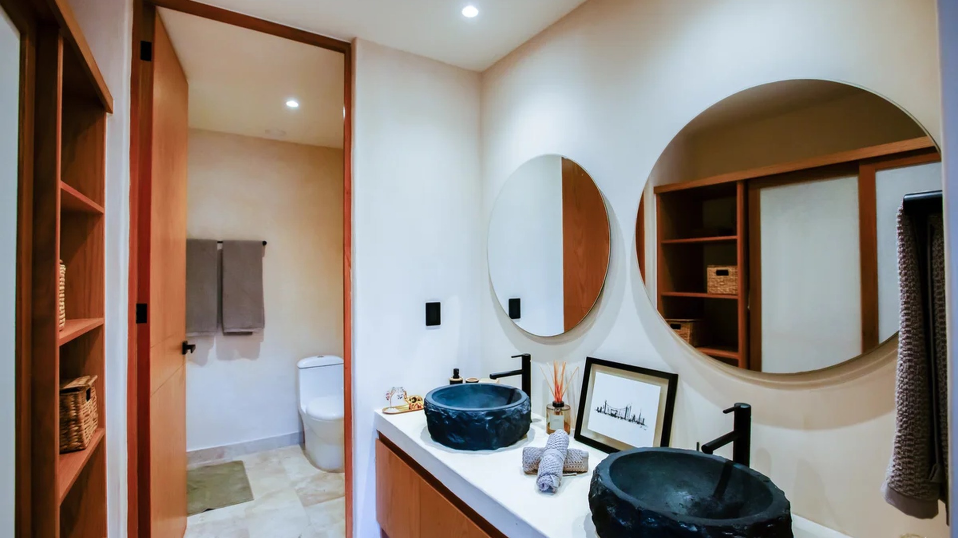 Image of a Modern Bathroom, featuring Double Vanity and Stone Vessel Sinks.