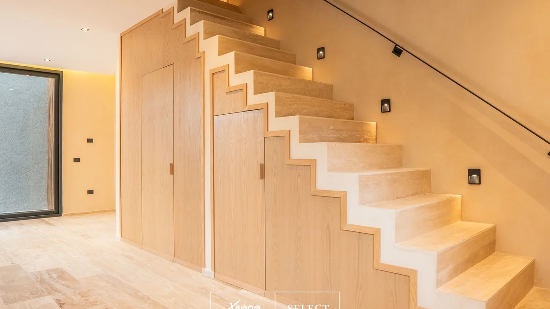 Image of a Stone Staircase, featuring Travertine Tile Flooring and Built-in Storage.