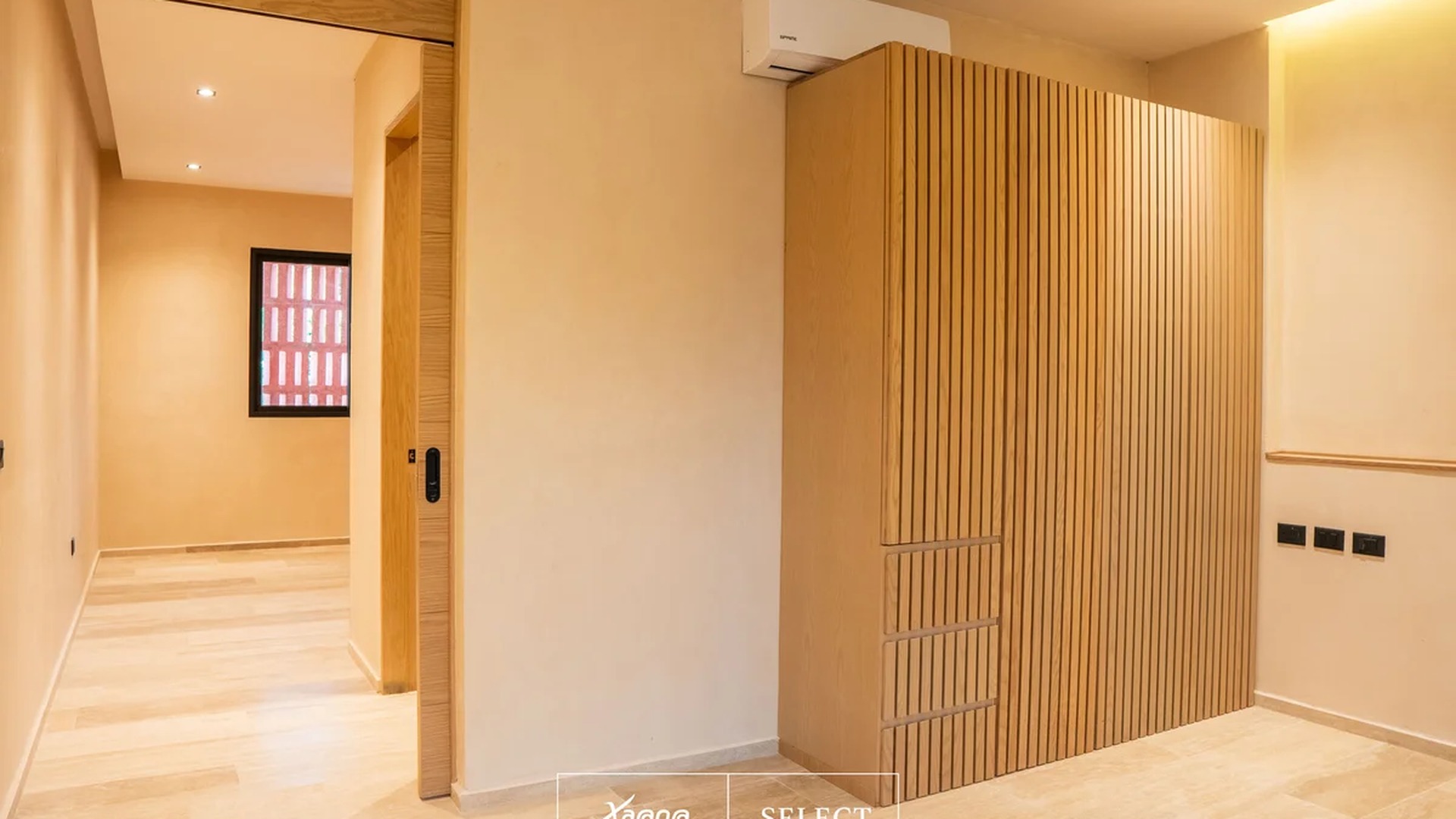 Image of a Modern Interior, featuring Slatted Wood Cabinetry and Built-in Wardrobe.