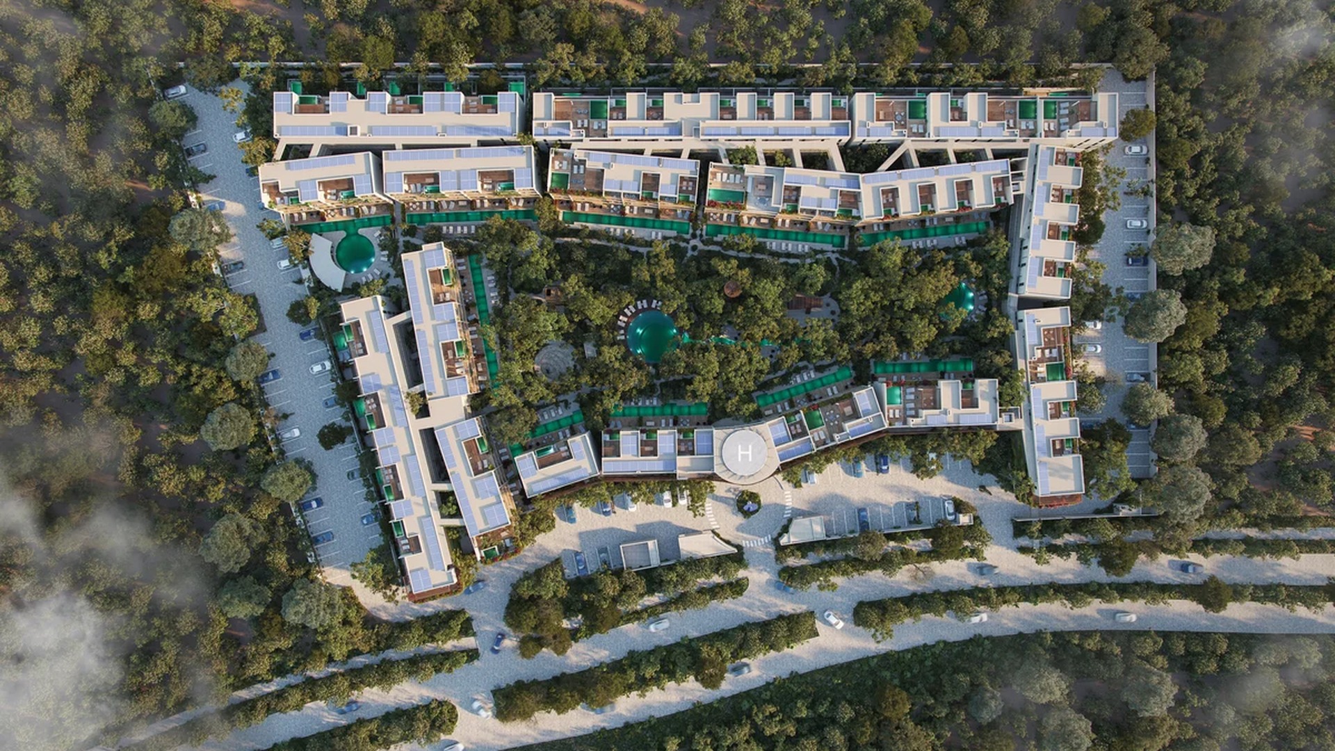 Image of a Resort Complex, featuring Aerial View and Lush Landscaping.