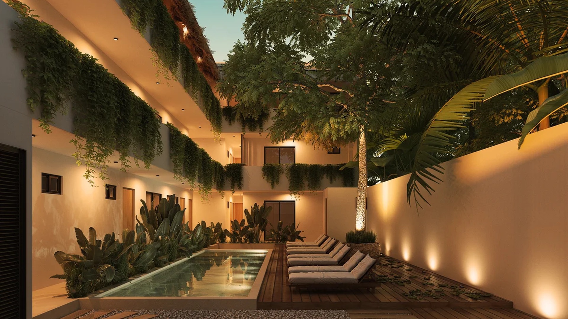 Image of a Courtyard Pool, featuring Wooden Sun Deck and Lush Tropical Landscaping.