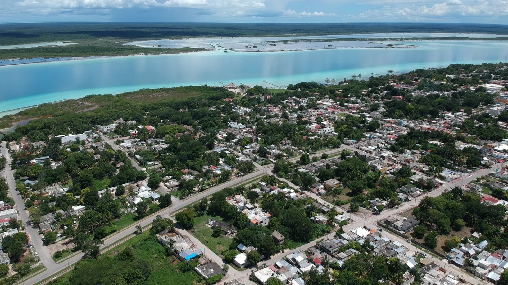 Image of a Aerial View, featuring Lagoon View and Coastal Town.