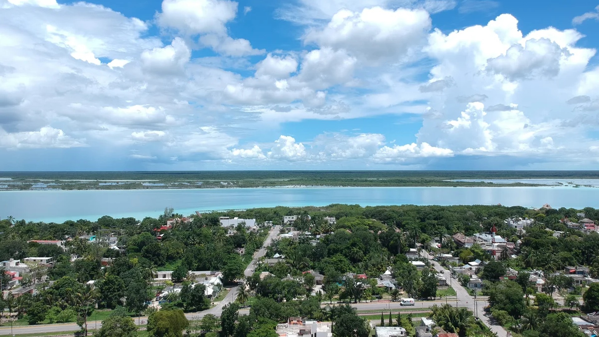 Image of a Aerial View, featuring Lagoon View and Coastal Town.