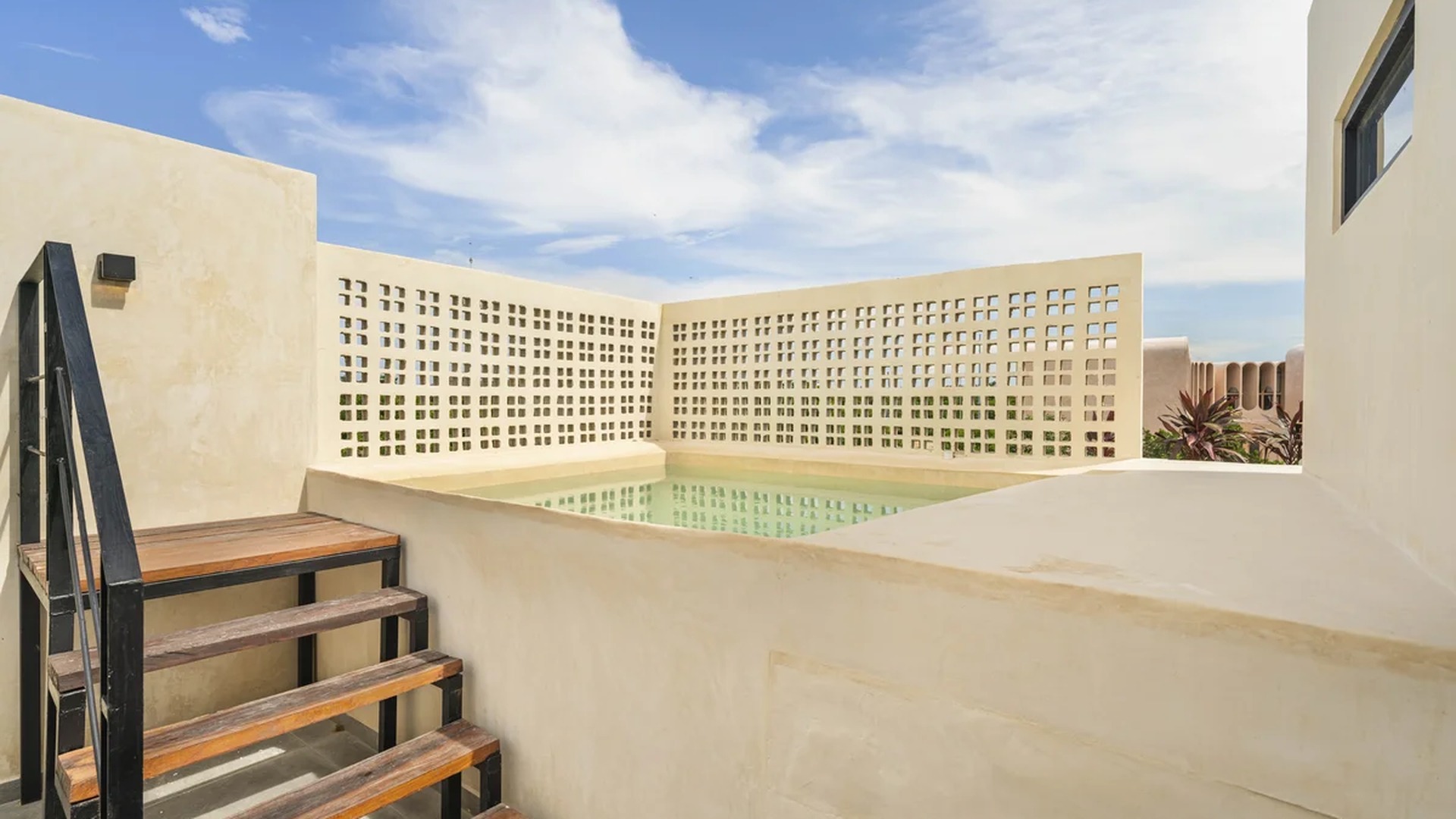 Image of a Rooftop Terrace, featuring Plunge Pool and Modern Architecture.