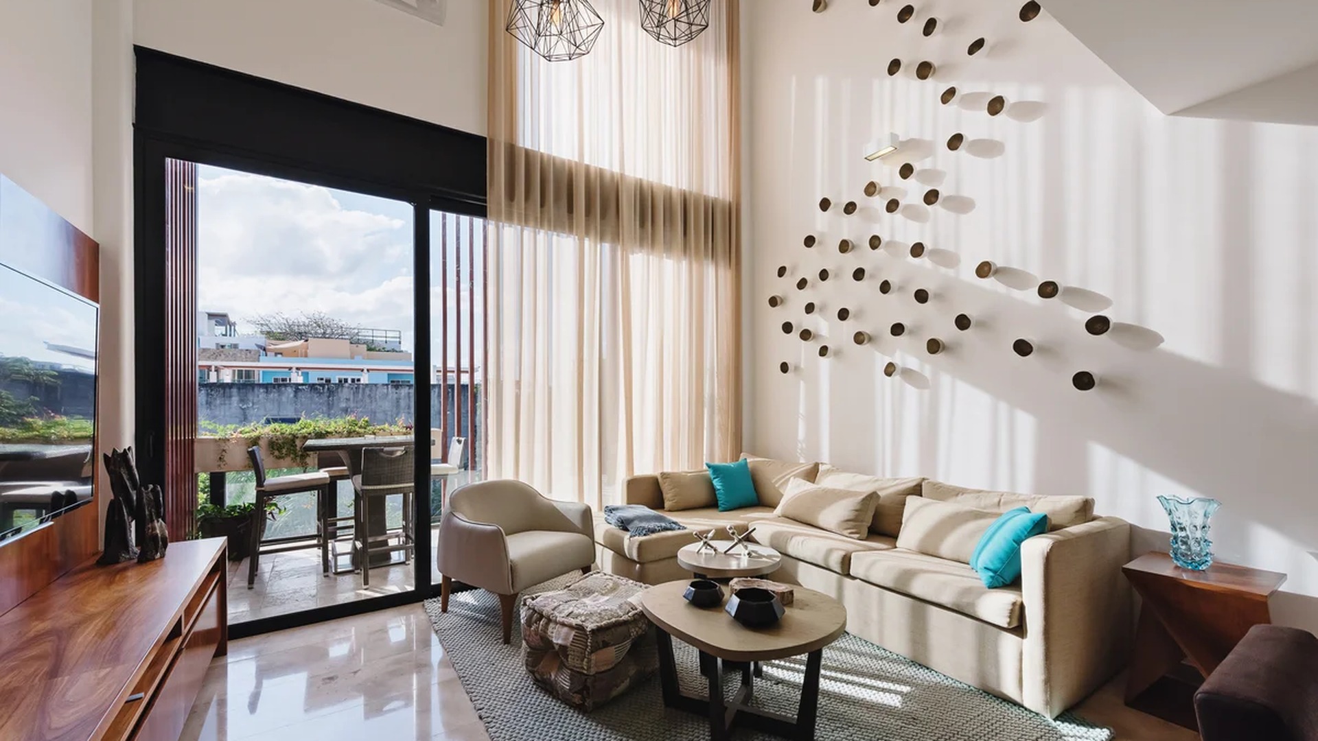Image of a Modern Living Room, featuring High Ceilings and Marble Floors.