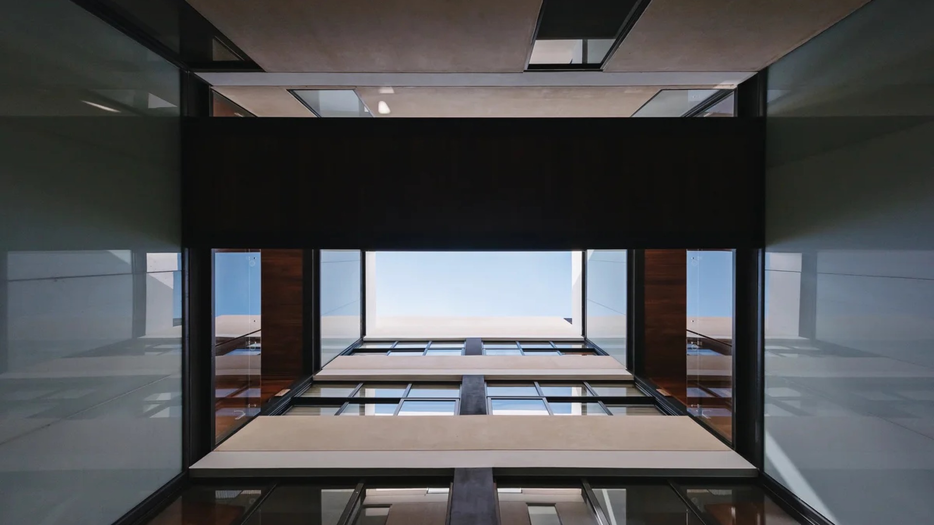 Image of a Modern Architecture, featuring Interior Courtyard and Multi-Story Atrium.