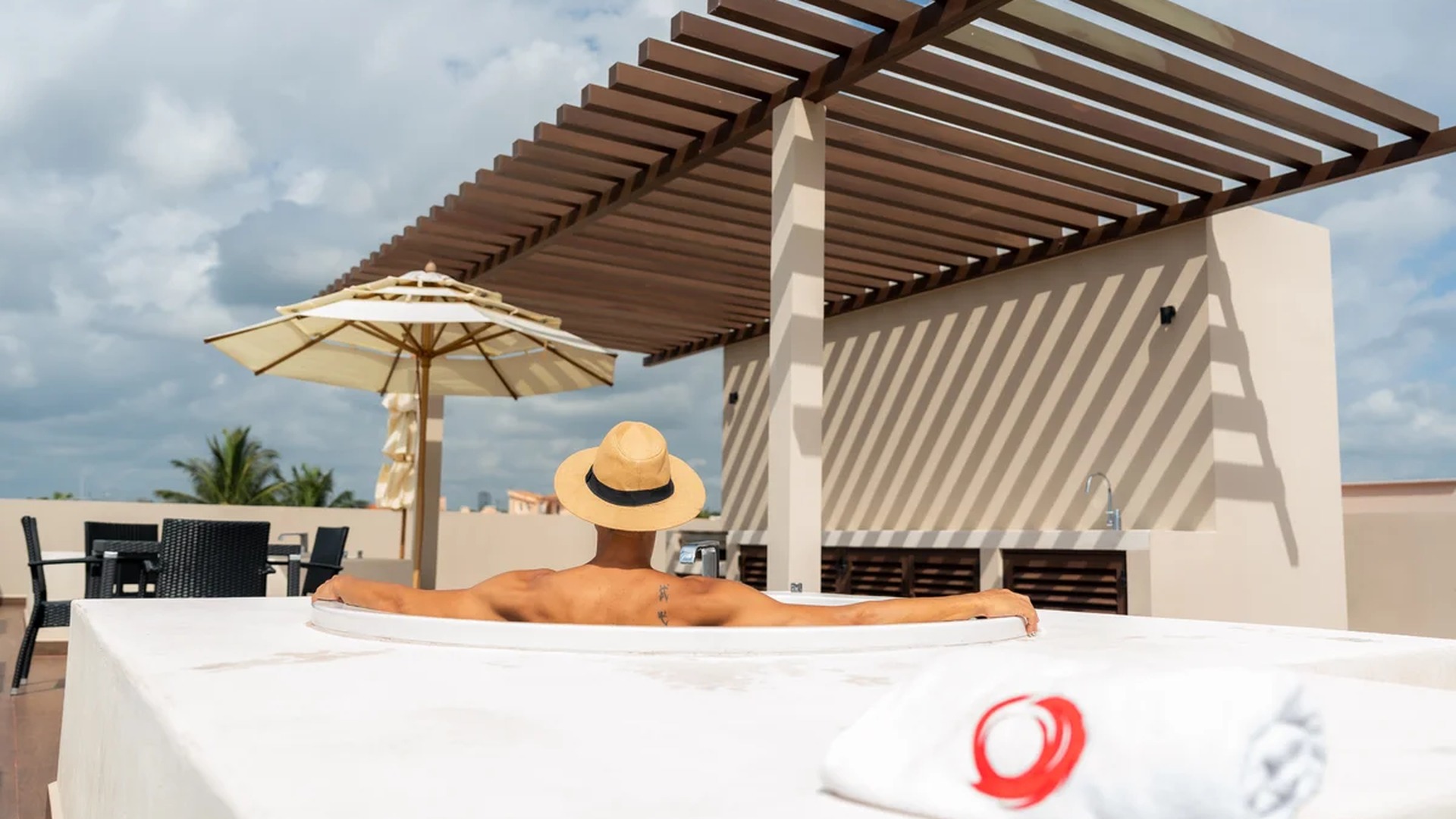 Image of a Rooftop Terrace, featuring Private Jacuzzi and Sundeck.