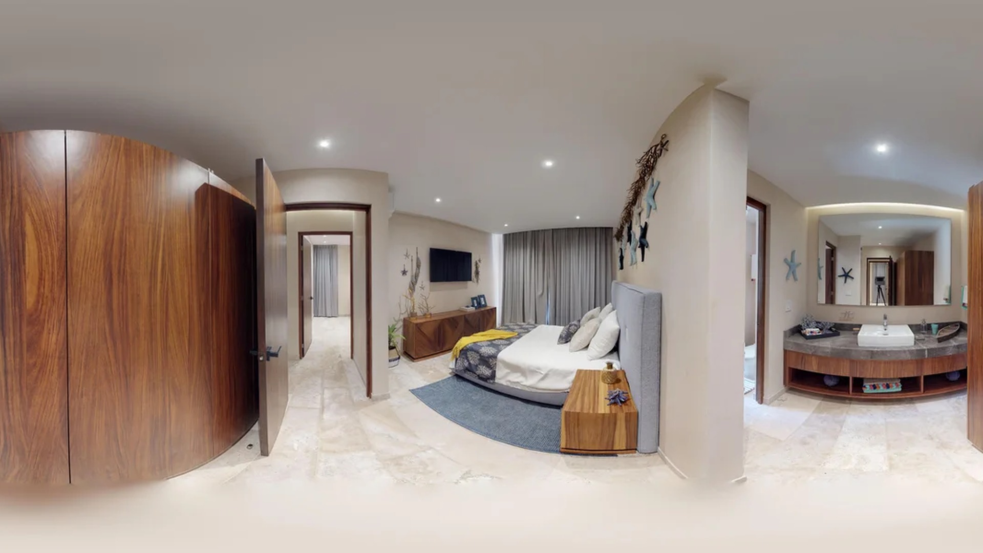 Image of a Bedroom Suite, featuring En-suite Bathroom and Stone Tile Flooring.