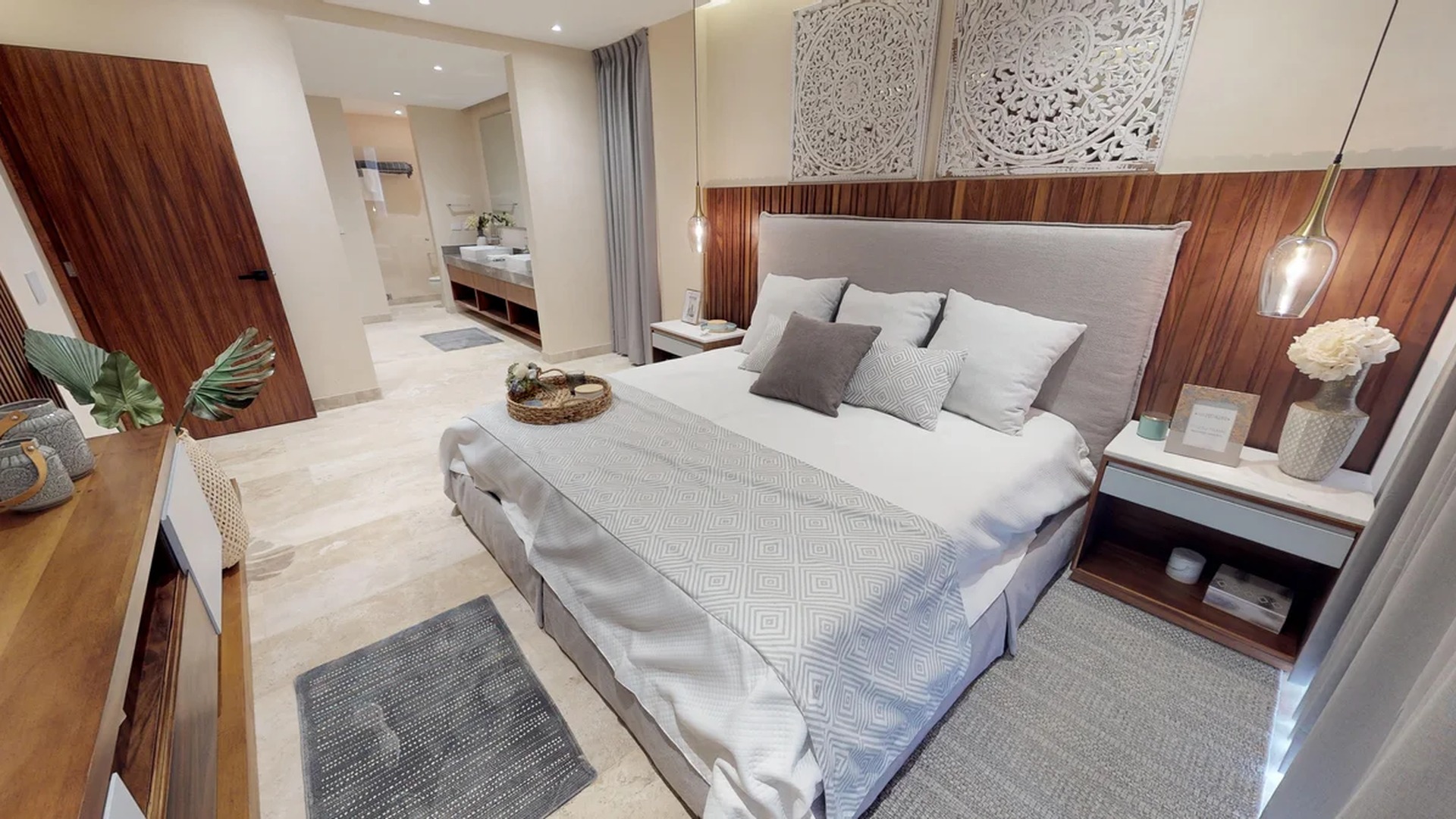Image of a Primary Bedroom, featuring En-suite Bathroom and Stone Tile Flooring.
