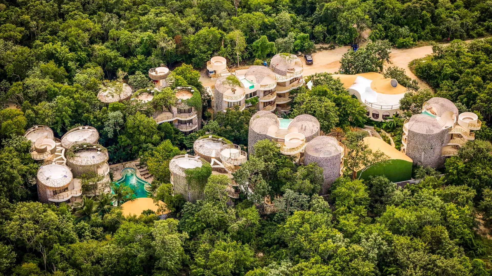 Image of a Jungle Retreat, featuring Organic Architecture and Luxury Villa Complex.
