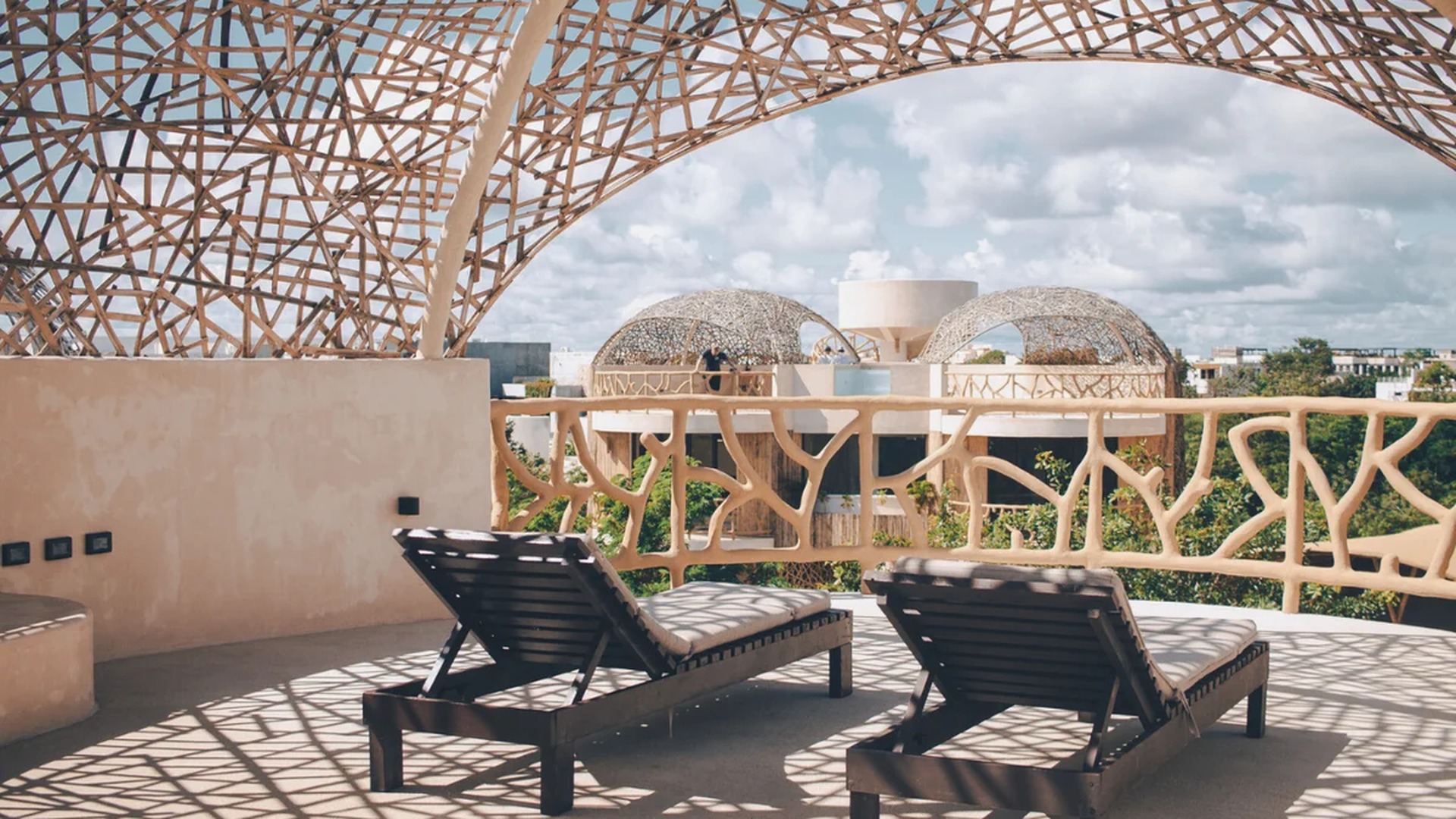 Image of a Rooftop Terrace, featuring Woven Lattice Canopy and Sun Deck.