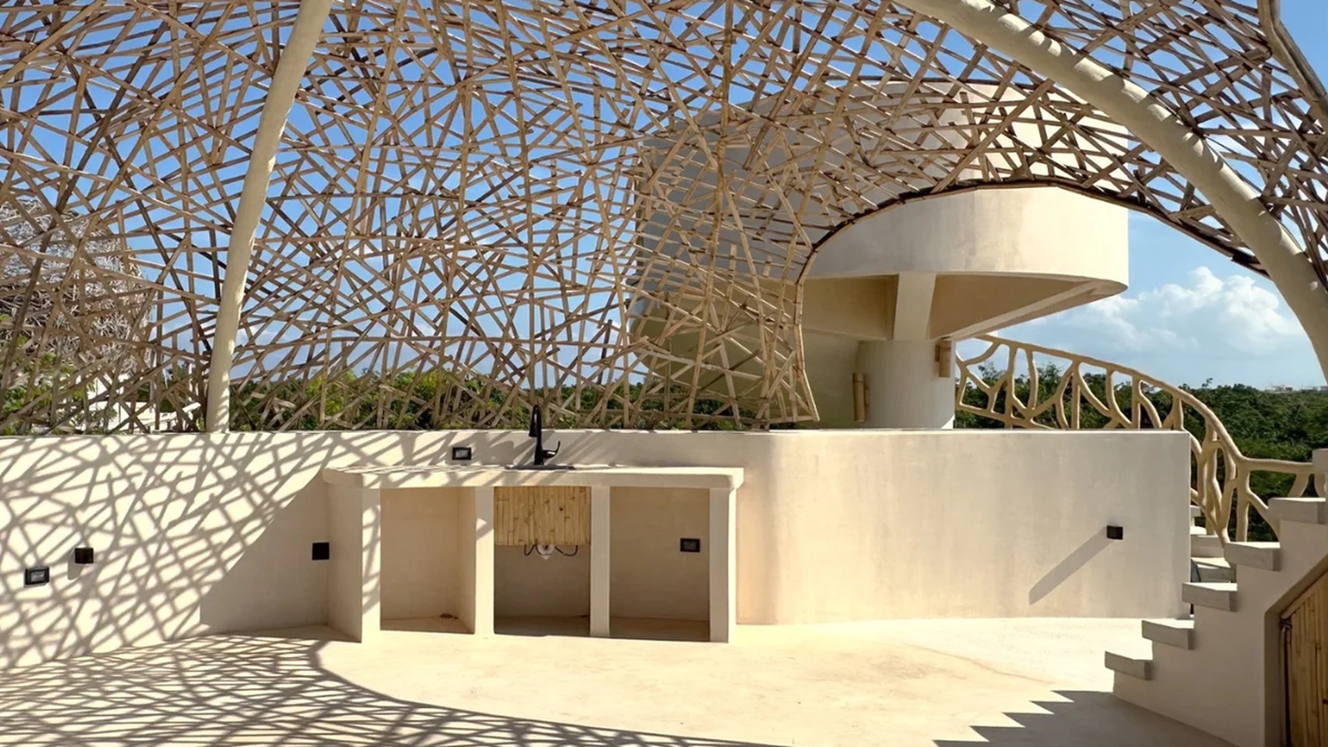 Image of a Rooftop Terrace, featuring Architectural Bamboo Canopy and Organic Architecture.