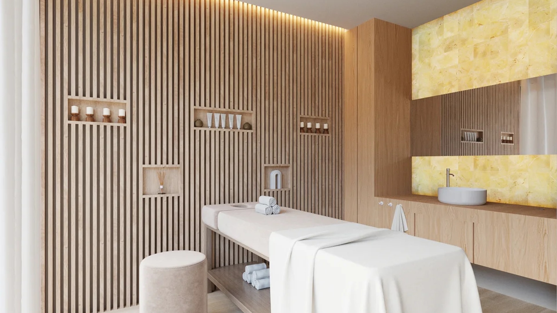 Image of a Spa Treatment Room, featuring Wood Slat Accent Wall and Light Wood Cabinetry.
