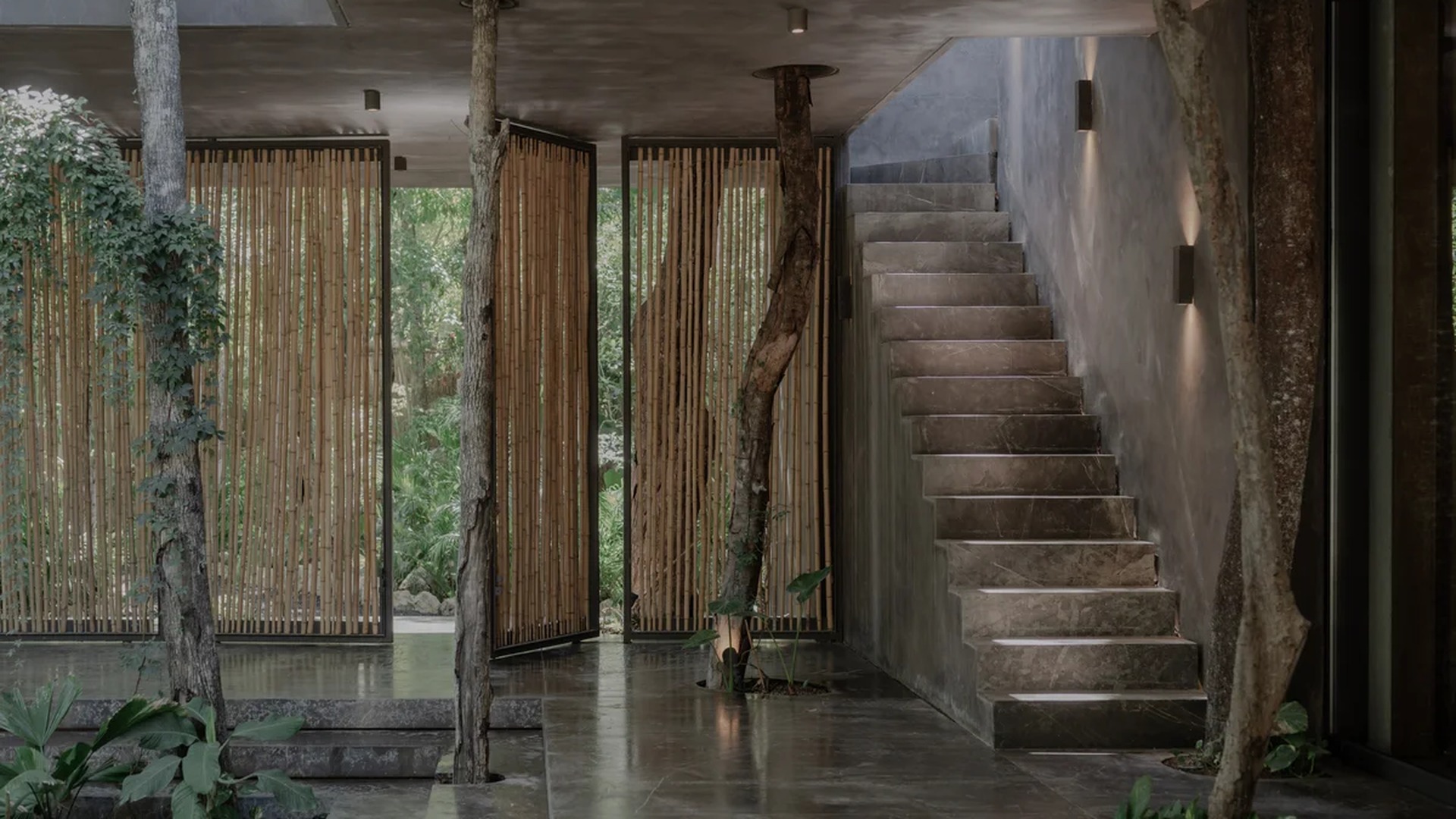 Image of a Biophilic Design, featuring Indoor-Outdoor Living and Marble Staircase.