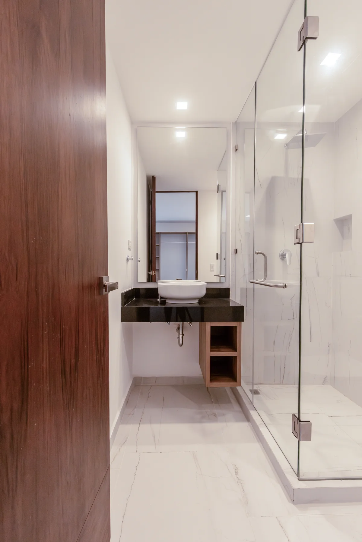 Image of a Modern Bathroom, featuring Walk-In Shower and Glass Shower Door.