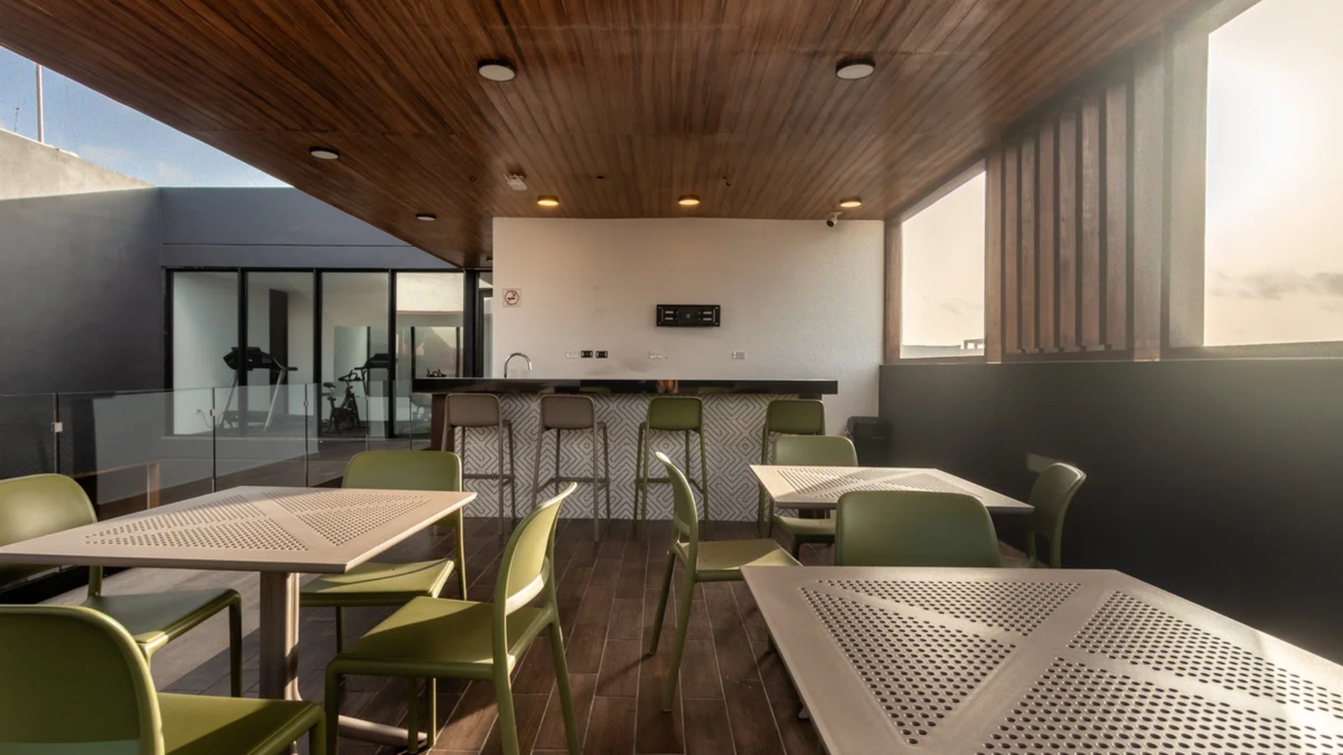 Image of a Rooftop Lounge, featuring Covered Terrace and Wet Bar.